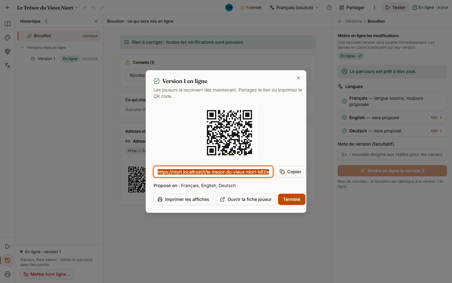 Fenêtre Version 1 en ligne : un grand QR code, le lien du parcours avec le bouton Copier, et les boutons Imprimer les affiches, Ouvrir la fiche joueur et Terminé.